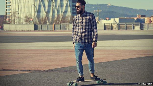 Hipster on skateboard