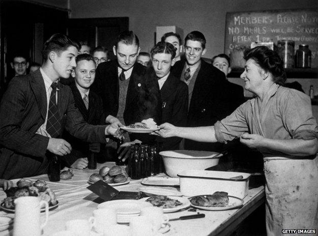 1944: Dinner is served at the City Boys' Luncheon Club, set up by the London Federation of Boys' Clubs to provide boys working in city offices with a hot lunch at an affordable price
