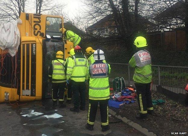 Emergency services at overturned truck