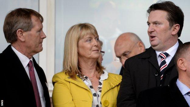 David King and Sandy Easdale chat in the stand