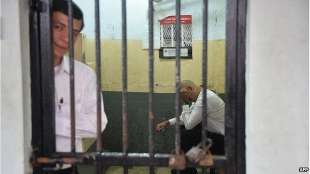 Ferdinant Tjiong and Neil Bantleman in a holding cell at court (19 March 2015)