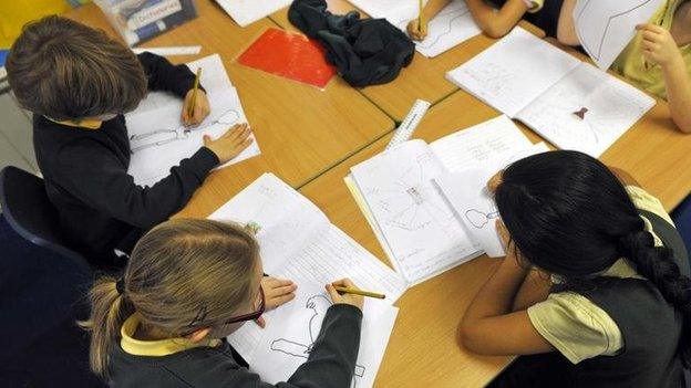 children working in a classroom