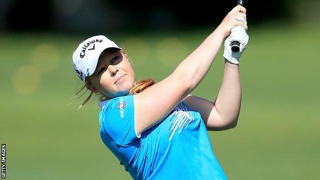 Stephanie Meadow watches his third shot at the 13th, where she posted a double-bogey six