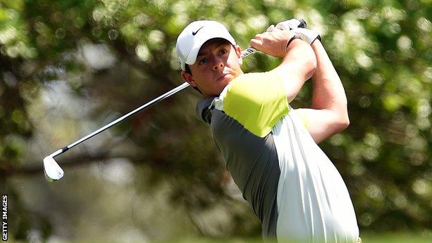 Rory McIlroy otees off on the fourth hole during the final round of the 78th Masters Golf Tournament at Augusta in 2014