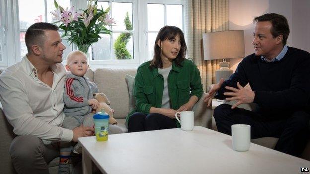 David and Samantha Cameron talking to a couple on a visit to Chorley in Lancashire