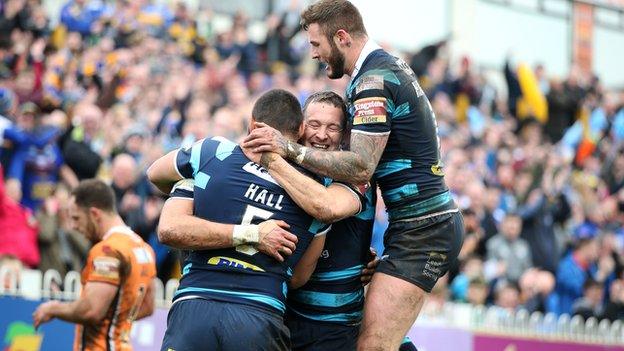 Leeds celebrate their second try of the afternoon at The Jungle, scored by winger Ryan Hall