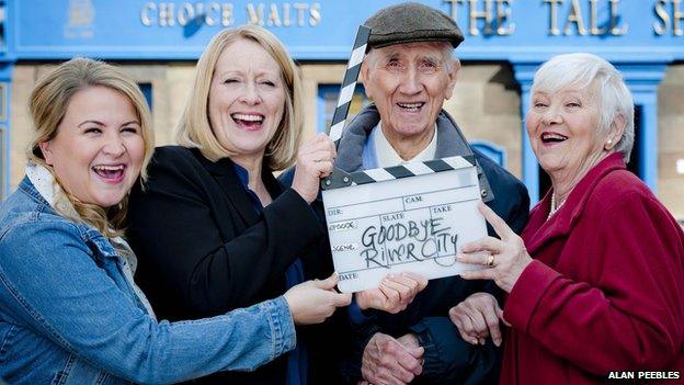 Actor Johnny Beattie with co-stars of River City on his last day of filming.