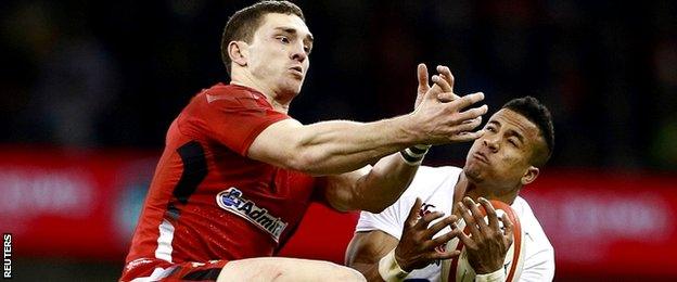 England's Anthony Watson (R) and Wales' George North