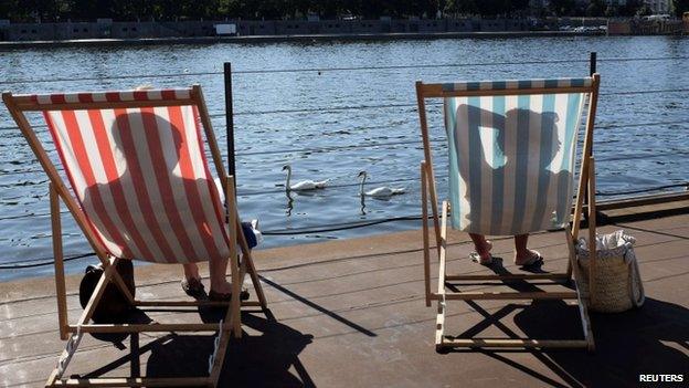 People sunbathing