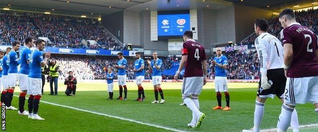 Champions Hearts were applauded on to the Ibrox pitch by the Rangers team