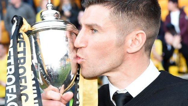 Livingston manager Mark Burchill with the Challenge Cup