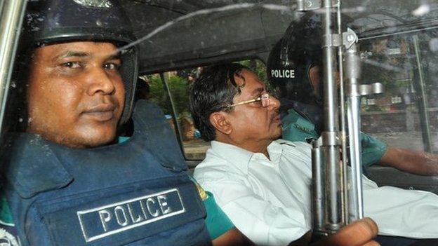 Muhammad Kamaruzzaman deputy head of the Jamaat-e-Isami Political Party being driven either to or from Dhaka Court in May 2013