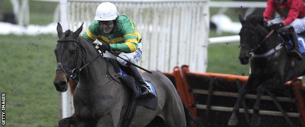 AP McCoy riding Shutthefrontdoor