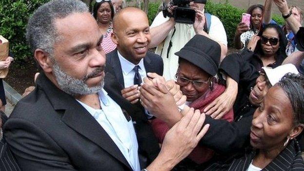 Anthony Ray Hinton is greeted by family outside the Jefferson County Jail in Birmingham, Alabama