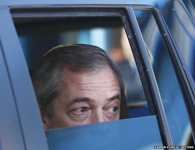 UKIP party leader Nigel Farage leaves an election campaign event in Carrick