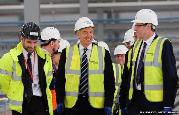 Tony Blair (C) visits the construction site for the new Hitachi Trains Europe factory in Sedgefield