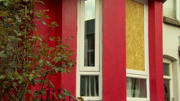 Windows in two of the houses in Mountcollyer Avenue were smashed with bricks