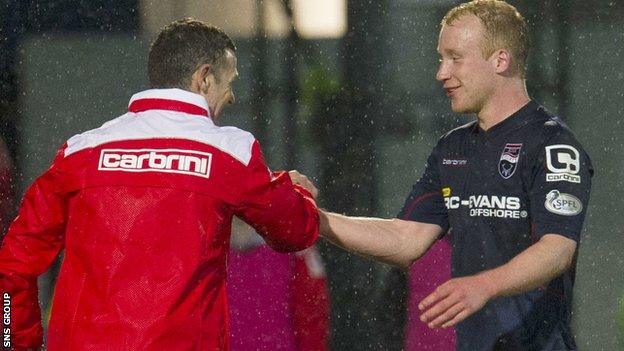 Manager Jim McIntyre congratulates goal-scorer Liam Boyce