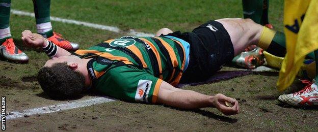 George North lies prone after being knocked out playing for Northampton against Wasps