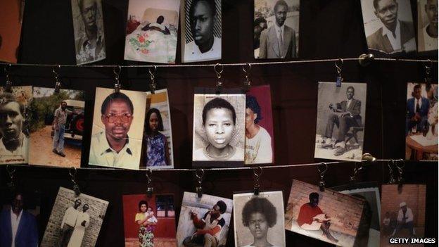 Family photos of victims of the 1994 Rwanda genocide (massacre) hang inside the Kigali Genocide Memorial Centre April 5, 2014 in Kigali, Rwanda