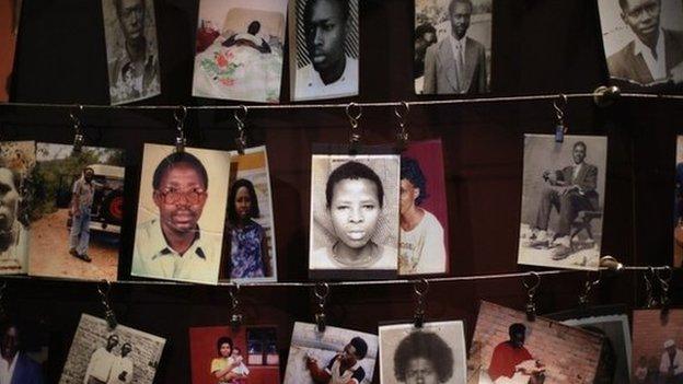 Family photos of victims of the 1994 Rwanda genocide (massacre) hang inside the Kigali Genocide Memorial Centre April 5, 2014 in Kigali, Rwanda