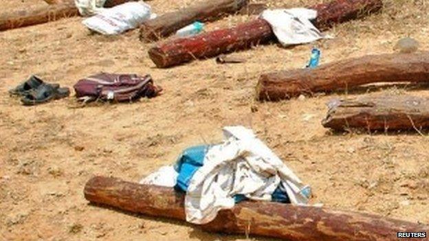 Red sandalwood logs strewn around at the location of Tuesday's fighting between suspected smugglers and the police in Andhra Pradesh