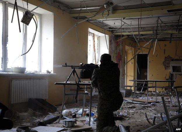 Rebel machine-gunner fighting for Donetsk airport, Oct 2014