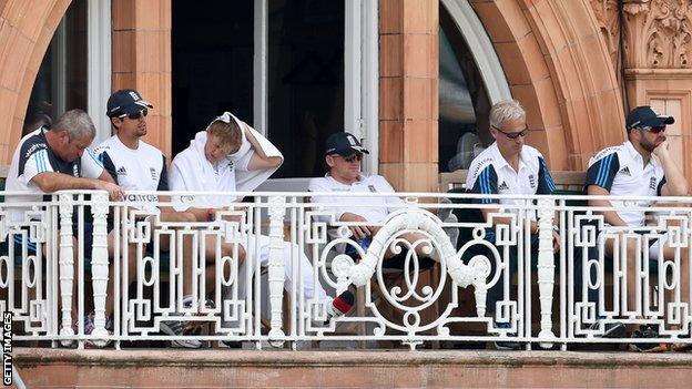 England players and management on the balcony