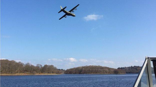 Conor Conneally photographed the plane flying low over Lough Erne as he was in a boat with his family