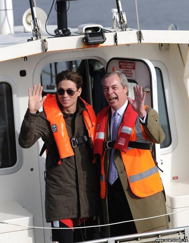 UKIP party leader Nigel Farage and The Only Way is Essex star Joey Essex take a boat trip from the harbour as they meet on the campaign trail in Grimsby