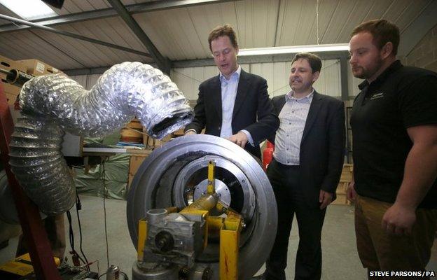 Liberal Democrat leader Nick Clegg with local candidate Duncan Hames (centre), during his visit to Dymag, a specialist manufacturer of high performance racing wheels while on the General Election campaign trail in Chippenham, Wiltshire