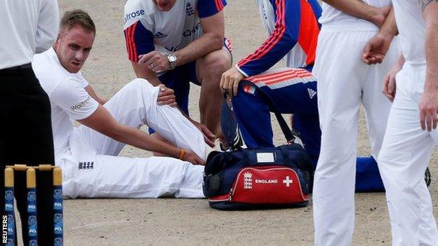 Stuart Broad receives treatment on an injury