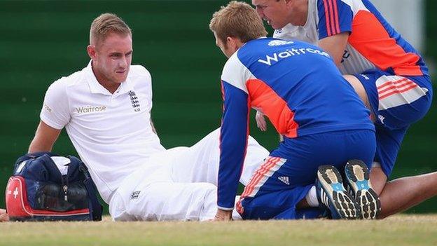 Stuart Broad receives treatment on an injury