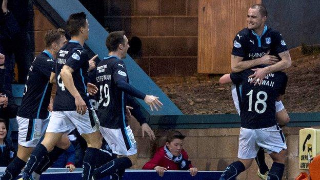 Dundee celebrate James McPake's goal against Dundee United