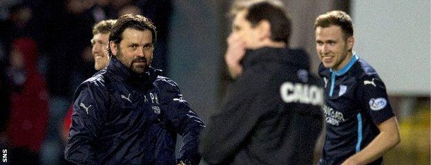 Dundee boss Paul Hartley (left) enjoys his first derby victory over Dundee United