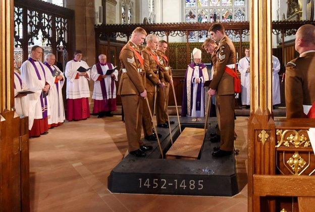 Richard III lowered into the ground at Leicester Cathedral