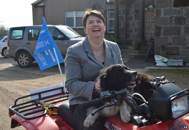 Ruth Davidson with Rio the Border Collie on a Quad Bike at Clochnahill Farm, Stonehaven