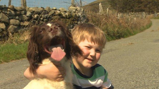 Diabetes dog, Jess, with six-year-old Jac