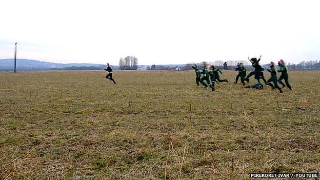 Norwegian girls chase parody of Agriculture Minister around a field