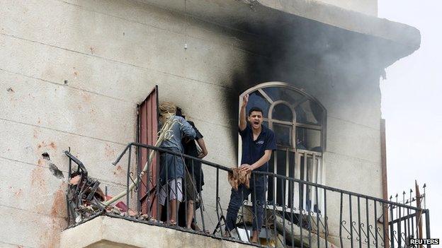 Scene of an air strike in Sanaa on 8 April 2015