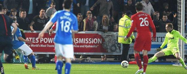 Gavin Reilly scores Queen of the South's third goal