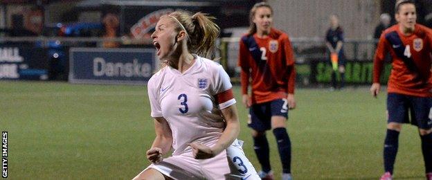 Leah Williamson celebrates scoring her crucial penalty