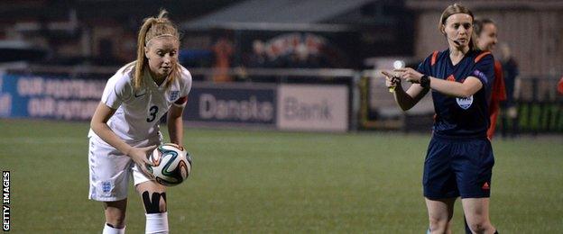 Leah Williamson prepares to take her penalty