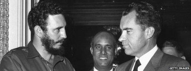 Cuban President Fidel Castro shakes hands with US Vice-President Richard Nixon during a press reception in Washington in 1959