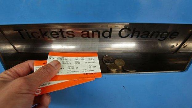 Man buying a rail ticket