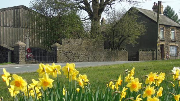 The war memorial and the former post office are all that remains of the village high street