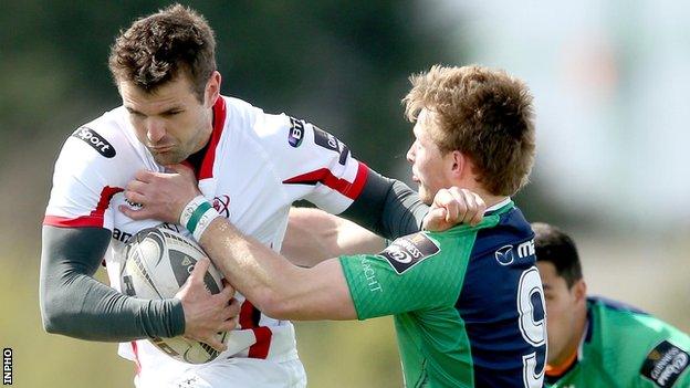 Jared Payne attempts to get past Kieran Marmion in Galway