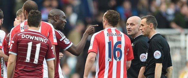 Carlton Cole of West Ham points at the referee after the draw with Stoke