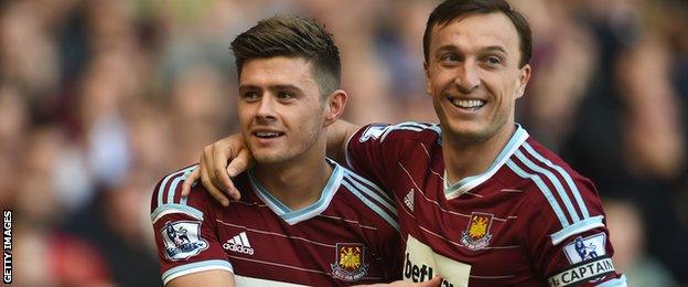 Aaron Cresswell and Mark Noble of West Ham