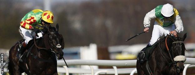 Leighton Aspell holds off the challenge of Saint Are aboard Many Clouds